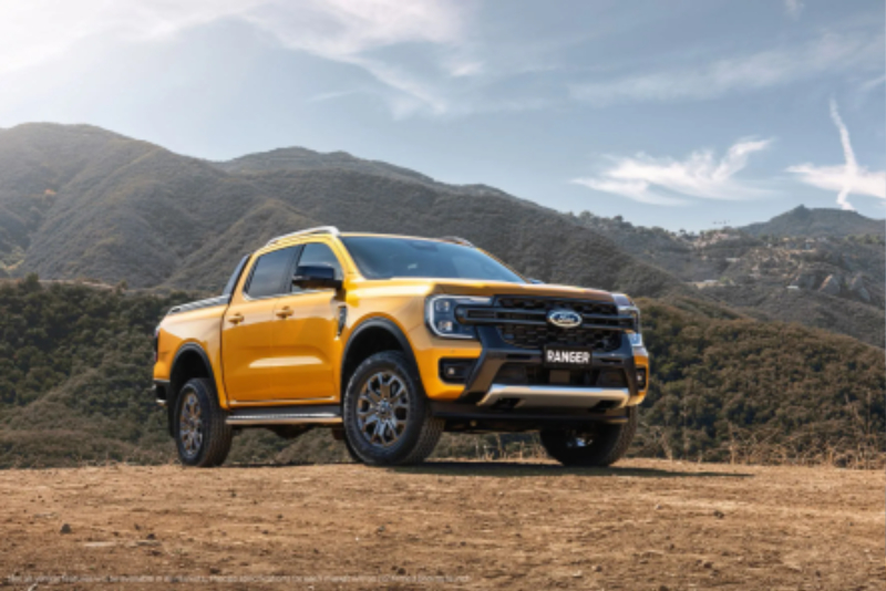 Orange-2023-Ford-Ranger-with-mountains-in-the-background.jpg